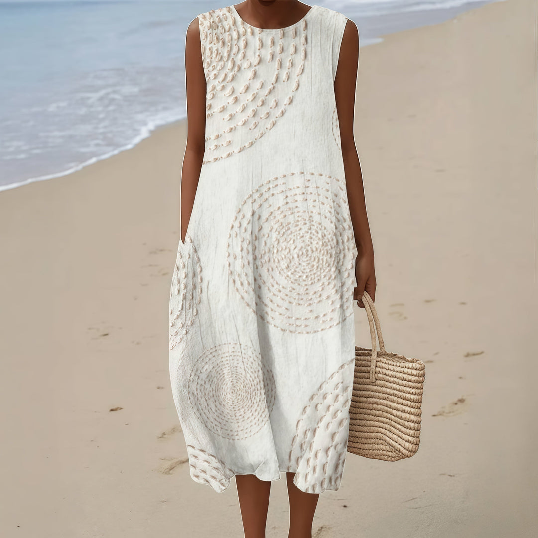 Francesca Sleeveless Summer Dress in white dotted/spiral