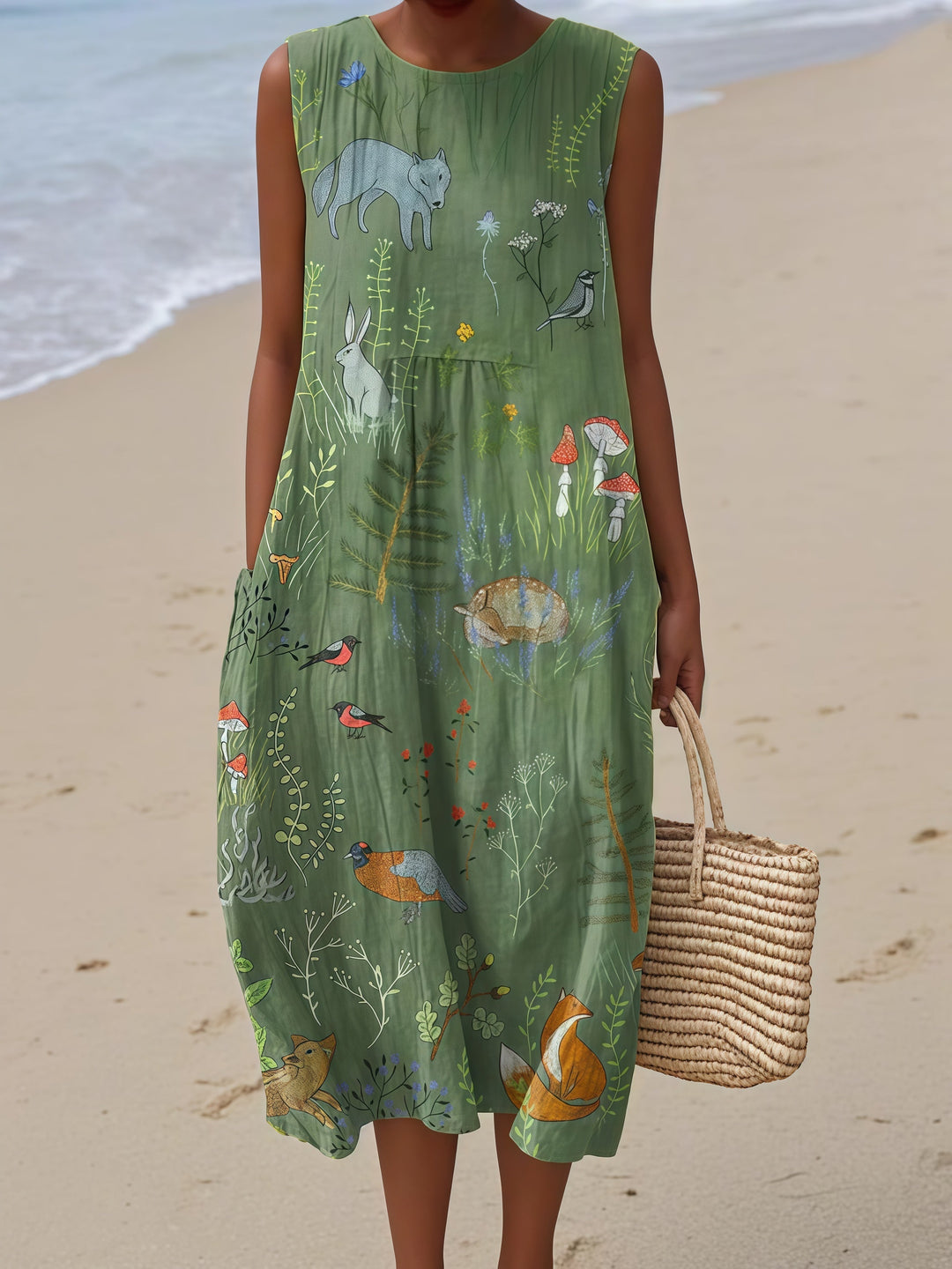 Francesca Sleeveless Summer Dress in green woodland/animals