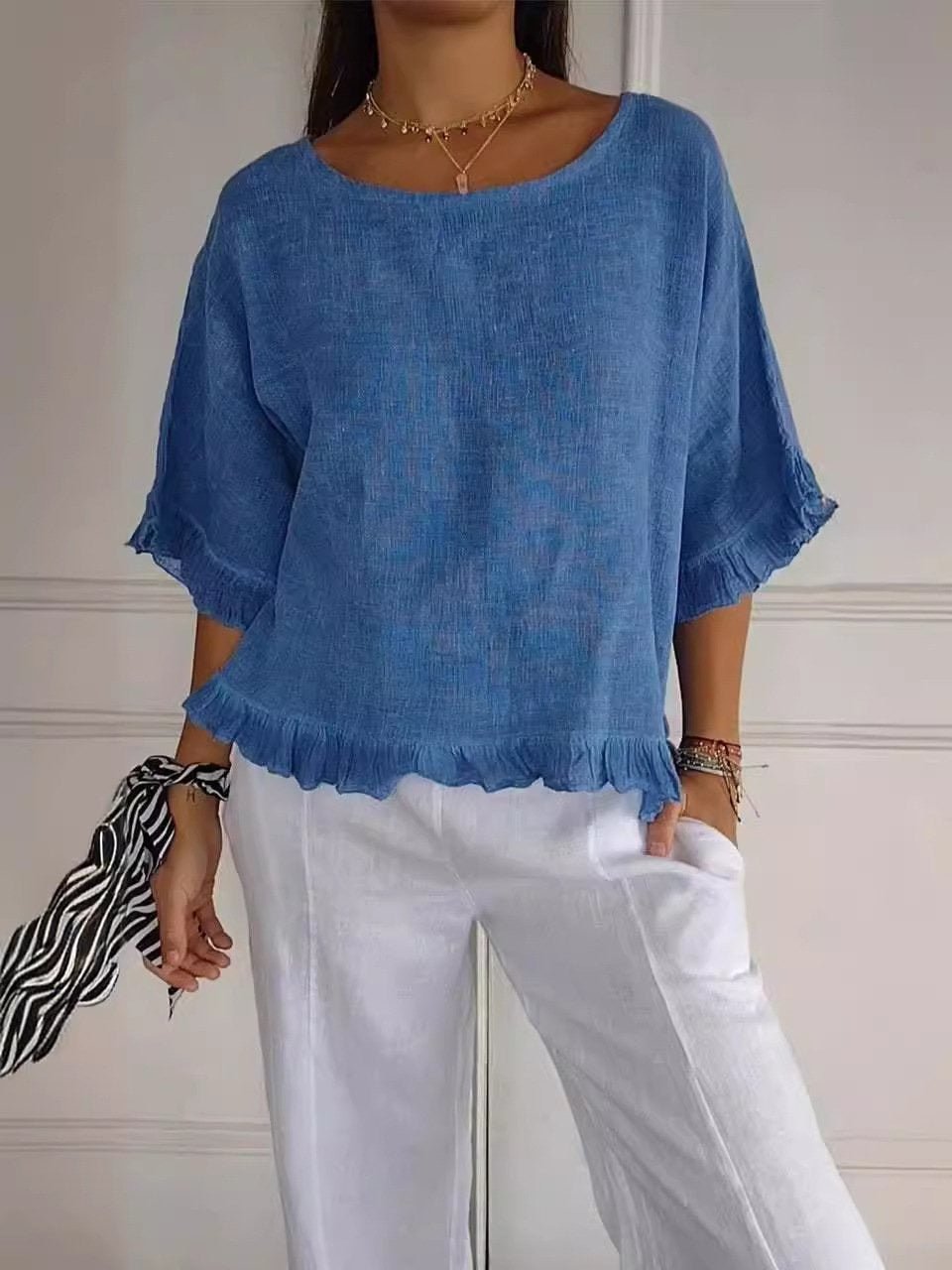 Rosabel Ruffle Hem Blouse in blue